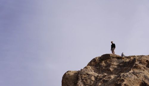 Kristofer on a boulder in Joshua Tree National Park.